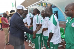 Liyel Imoke, in exchanging pleasantries with the technical crew of the Nigerian U-17 , the Golden Eaglet during the team's ongoing International friendly encounter with Botswana U-17 team at the U J Esuene stadium in Calabar