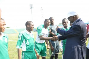 Nigerian U-17 Captain, Musa Muhammed introducing the players to Cross River State Governor, Senator Liyel Imoke shortly before the kickoff of the ongoing International friendly encounter between Nigeria and Botswana U-17 team at the U.J Esuene stadium in Calabar