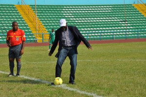 Cross River State Governor, Senator Liyel Imoke, taking the kick-off  while the centre referee watched with admiration at the ongoing International friendly encounter between Nigeria Goldeen Eaglets and their Botswana counterpart at the U.J Esuene stadium in Calabar, today