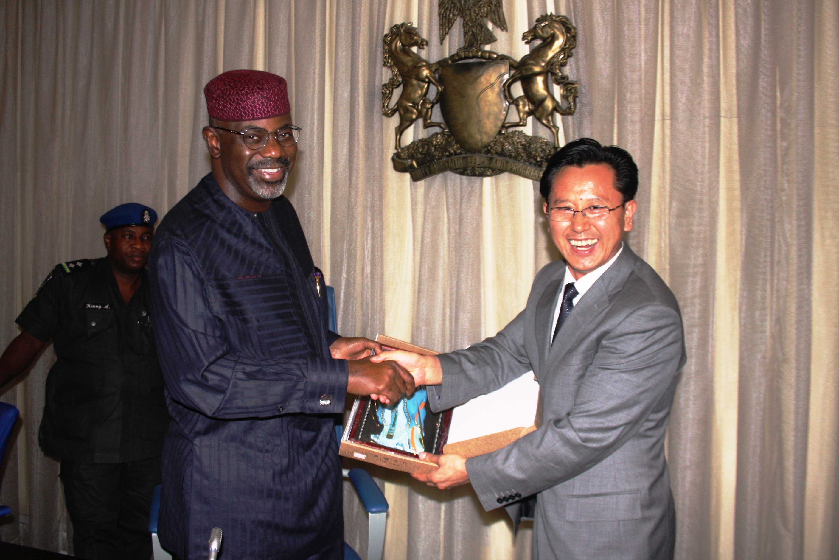 Cross River State Governor, Senator Liyel Imoke(L) receiving a letter of invitation to China from Deputy Mayor of Chang Chun Province,China, Mr. Gui Guangli when the latter led a delegation on Trade Mission to Government House Calabar, yesterday, Friday