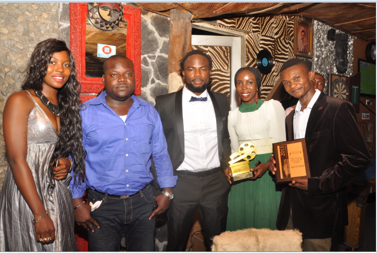 African Film Critics Award (NAFCA) aka Black Oscar, Best Actor in diaspora of the year award winner, Igoni Archibong (middle) with friends at the surprise party to honor him in Calabar on Monday