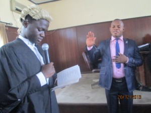 The Officer Of Oaths administring Oath of Office to the new NUCJ UNICAL President on Saturday