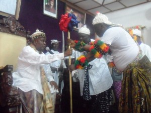 Obong of Calabar presenting Staff of Office to the Etubom of Ikot Ene-Obong House