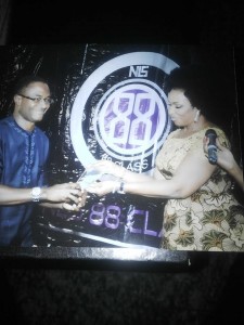 Barrister Venatius Ikem receiving his award from the Cross River First Lady, Mrs. Obioma Imoke