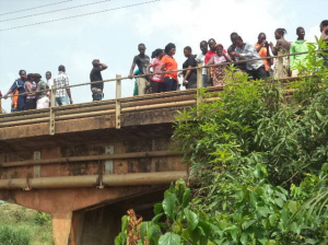 A crowd of onlookers at the scene of the tragic incident