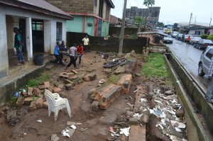 Collapsed Porthacourt Electricity Distribution Company (NEPA) office fence at Elijah Henshaw