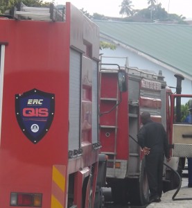 Men of the Cross River State Fire Service on hand to contain the fire. picture credit: calitown.com