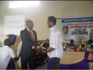 Dr. Ejue Bassey, Rector COE Akamkpa receiving an award during the event 