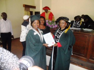 One of the inductees receiving her certificate