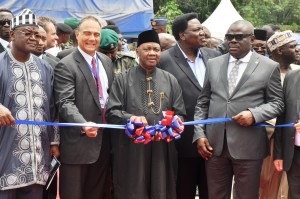 Vice President Arch. Namadi Sambo flanked by the Deputy Governor of Cross River, Mr. Efiok Cobham, Minister of Culture and Tourism High Chief Edem Duke (R) and  Chairman Unicem Board of Directors, Mr. John  Coumantaros, Minister of State for Trade and Investment, Dr. Samuel Ortom in a symbolic cutting of tape during the ground breaking ceremony for the construction of additional 2.5 million metric tons production line of United Cement Company, in Mfamosing, Cross River today