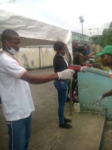 Officials screening spectators into the U.J. Esuene stadium, Calabar, venue of today's Super Eagles/Congo African Cup of Nation's qualifier