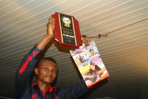 CrossRiverWatch Entertainment Editor, Akpet Obaji receiving the 'Media Man Of The Year' Award on behalf of Agba Jalingo, Publisher,  CrossRiverWatch