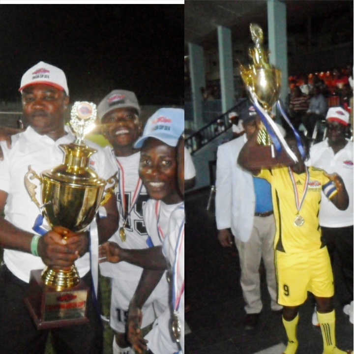 2014 male and female champions displaying their trophies
