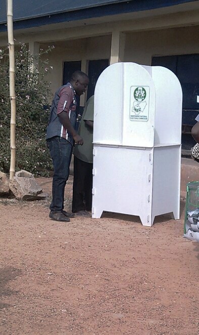 A PDP agent canvassing for votes in the voting cubicle yesterday