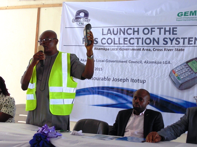 The Chairman of Akamkpa LGA, Hon. Joseph Itotup officially launches the POS collection system.