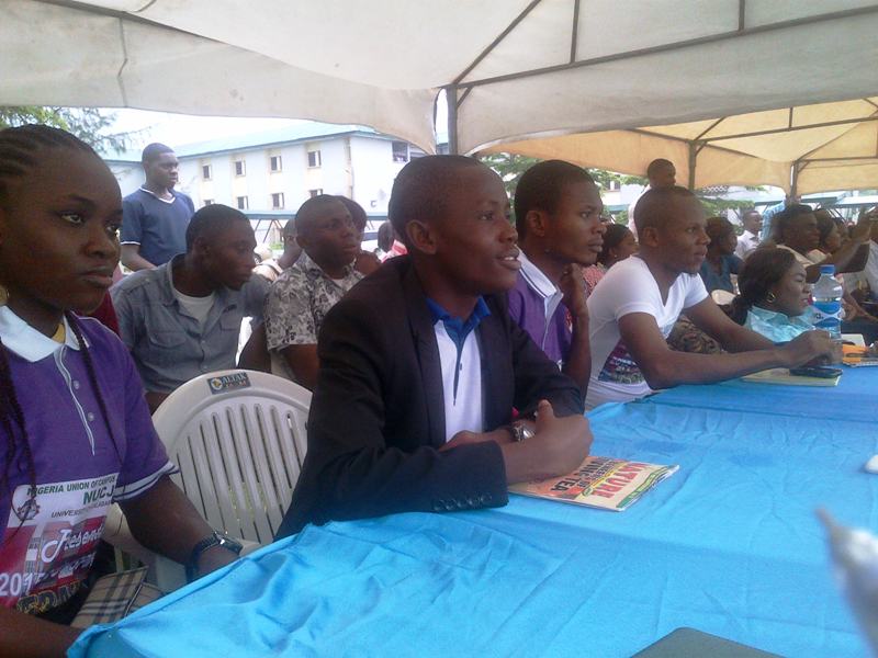 Cross section of students listening anxiously