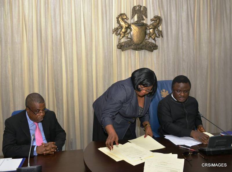 Governor Ben Ayade sorting out the bills with the Secretary to State Government, Mrs. Tina Agbor while Deputy Governor, Ivara Esu looks on earlier today in Calabar