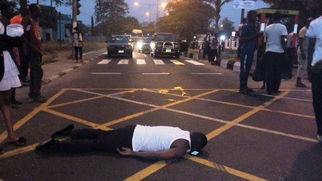 One of the physically challenged protester lying on the road