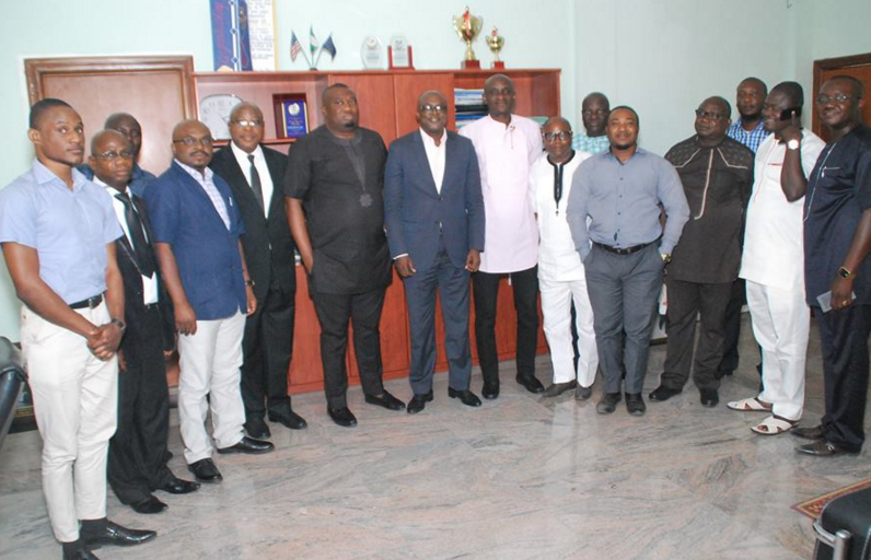 Cross section of the visiting delegation from Hit FM and the Speaker of CRSHA, Hon. John Gaul (middle) and some members of the House in a group photograph after the visit