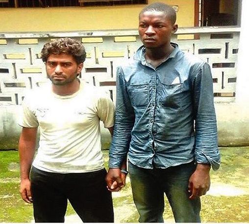 Arrested Pakistani and his Cameroonian accomplice
