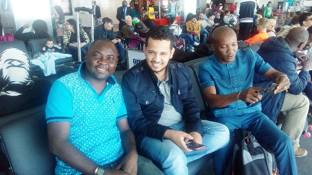 Declan Ogar, an unidentified passenger and Ndiyo at the Departure Hall of the Murtala Mohammed International Airport on their way to the World Youth Summit in Colombo
