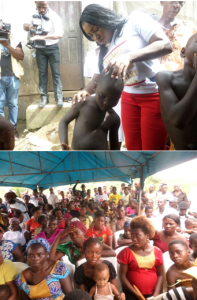 Dr. Betta attending to a sick child and the Bakassi women in a chat with the DG (below)