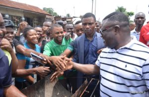 Ayade in a handshake with Cross Riverians