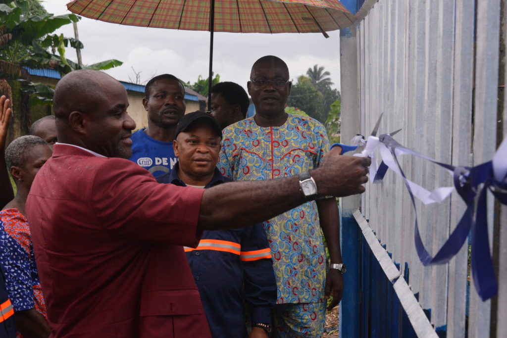 Hon Iyadim commissioning one of the projects while DG< SEA, Jake Otu Enay looks on