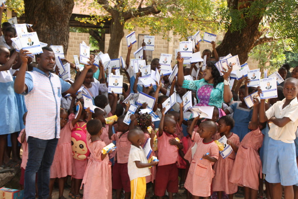 Pupils waving books received 