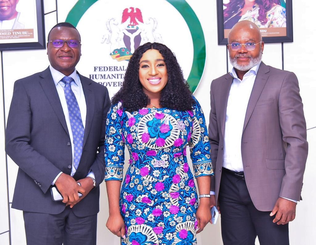 Minister for Humanitarian Affairs and Poverty Alleviation, Dr. Betta Edu (M), General Manager of Policy, Government, and Public Affairs, Mr. Esimaje Brikinn (L), and the Director of Government Affairs , Chevron, Mr. Sam Daibo (R) in a photograph after a collaboration meeting at the Minister's office in Abuja, the Federal Capital Territory. 25/10/2023 (Credit: FMHAPA/Smart Agbor)