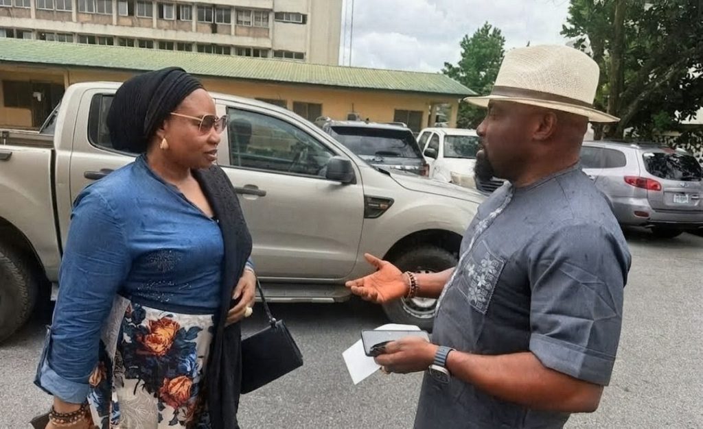 Captain Edom Tawo on the right speaks with Hon. Blessing Egbara at the Old Secretariat Complex in Calabar