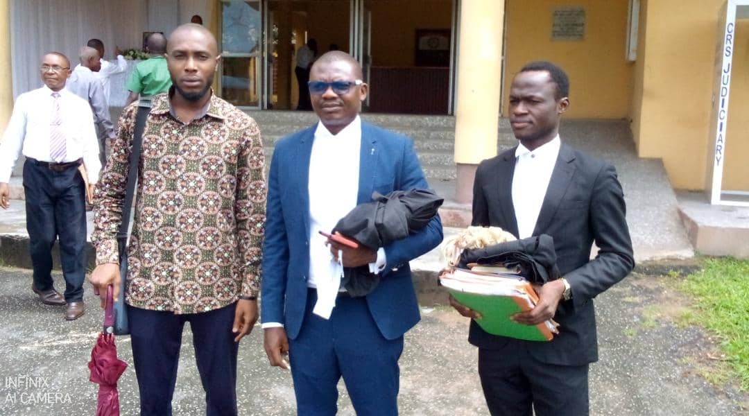 From L-R: CrossRiverWatch Managing Editor, Jeremiah Archibong, James Ibor Esq and Kehole Enya Esq walk out of the High Court of Justice complex in Calabar on October 6, 2021 after a libel and defamation suit brought by the Cross River State Government against CrossRiverWatch and Agba Jalingo stalled due to the absence of the Government’s witness. (Credit: CrossRiverWatch/Jonathan Ugbal)