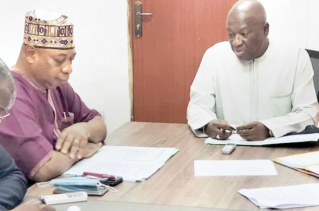 Secretary General, Maritime Organisation of West and Central Africa (MOWCA), Dr Paul Adalikwu (left) during a meeting with Gambian Minister of Transport, Works and Infrastructure, Hon. Bai Lamin Jobe, in Banjul, recently. (Credit: The Nigerian Tribune)