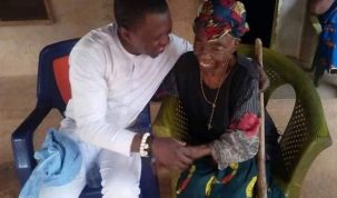 Citizen Agba Jalingo and his grandmother, Mrs Mary Andokie Ikwen (nee Ushie) during a visit to her in 2021.