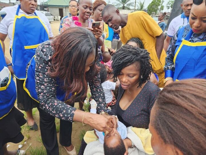 Dr. Janet Ekpenyong administers an oral vaccine to a child shortly after Cross River State Deputy Governor, Professor Ivara Esu flags off the 2022 Integrated Measles And Rota Vaccine Campaign in Calabar, Cross River State