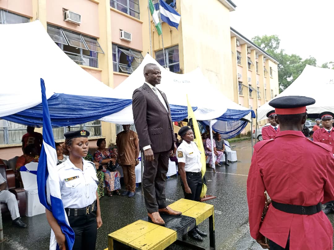 Mr. Timothy Akwaji receives a passing - out salute from men of the Cross River State command of the Nigerian Police Force on his last official day in office as Head of Service at the New Secretariat Complex in Calabar