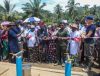 Members of benefitting communities line up for the hand-over ceremony of rehabiliatated boreholes in Akamkpa Local government Area of Cross River State. Four boreholes in three communities were renovated by the WCS and funded by the USAID through the Watershed Protection for Safe and Sustainable Water Supply, WATERFALL program. (Credit: WCS)