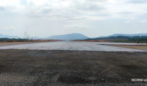 The runway of the Obudu International Passenger and Cargo Airport showing part of the turnpad and what may be a displaced threshold upon completion.