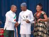 Sports Development Minister, Senator John Owan Enoh receiving the Africa Sports Man of the Year award by ASTA