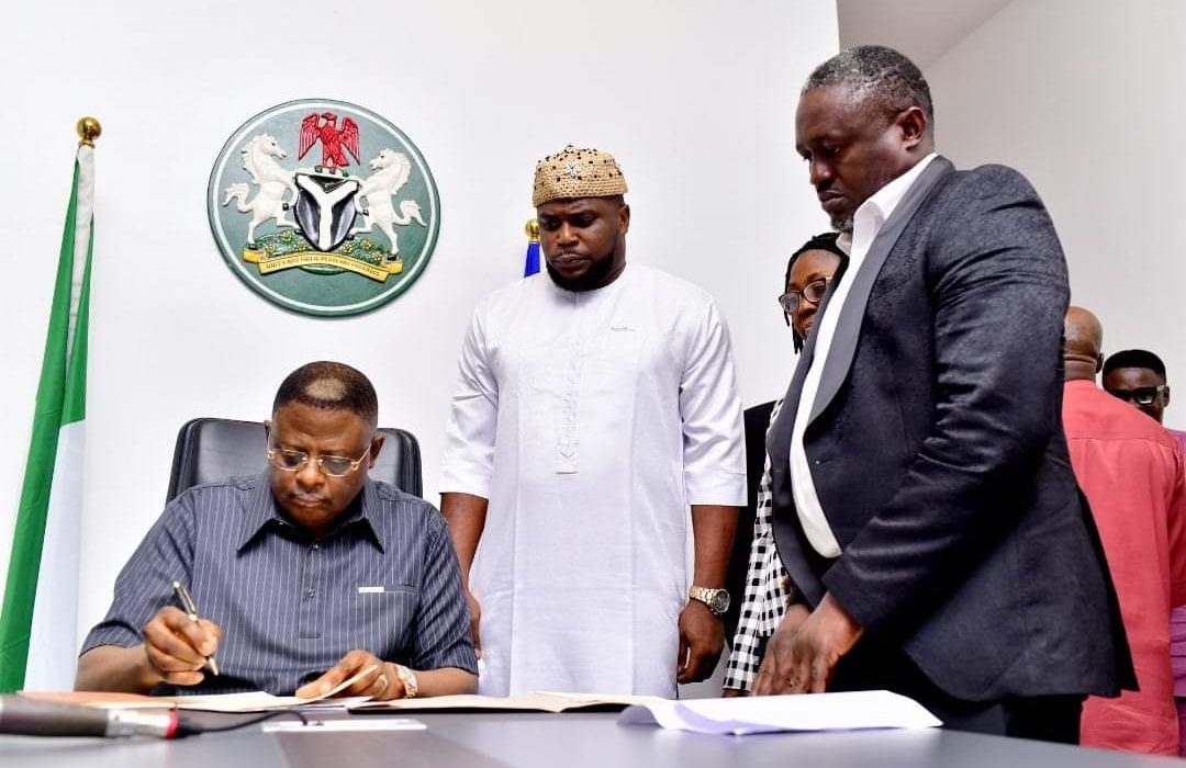 L-R: CRS Gov. Senator Bassey Otu; Chairman, CRSHA Cttee on Finance and Appropriation, Hon. Cyril Omini; Clerk, CRSHA, Barr. Margaret Ikposhi, and the Speaker of the CRSHA, Rt. Hon. Elvert Ayambem, during the signing of the 2024 supplementary budget into law at the temporary Governor's office, Calabar 26/7/2024. (Credit: GHC)