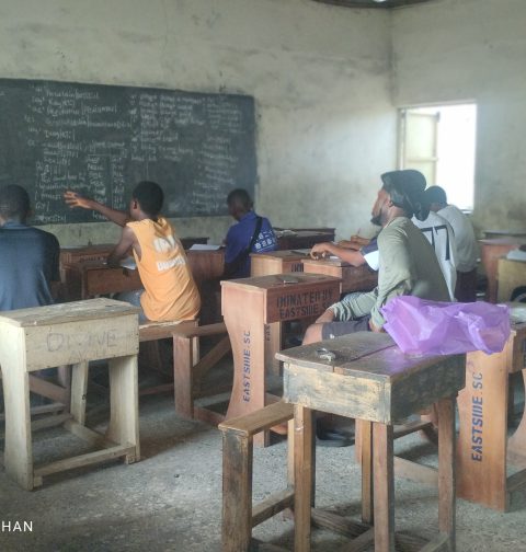 Candidates listening to a tutor at one of the study centers
