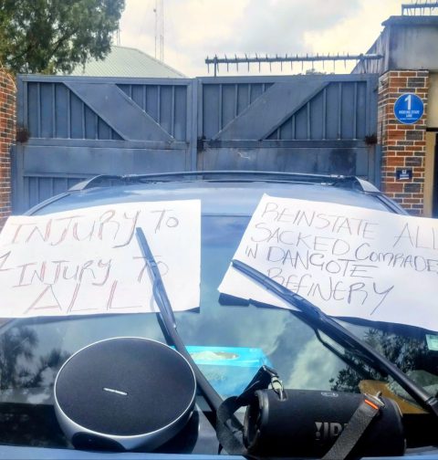 Placards used by members of PENGASSAN displayed on a vehicle used to barricade the entrance to the Cross River State office of the Nigerian Midstream and Downstream Petroleum Regulatory Authority, NMDPRA (29/9/2025)